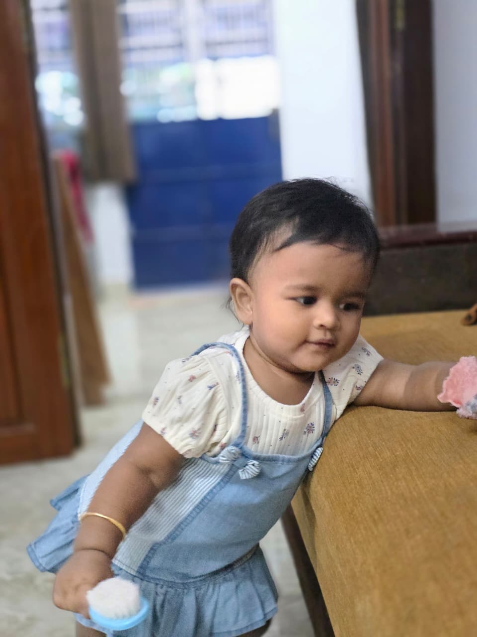 Mughithra playing
